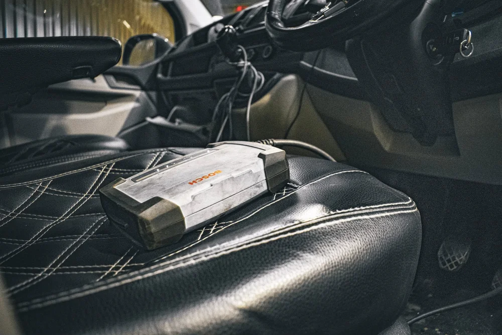 Bosch diagnostic unit connected inside a van